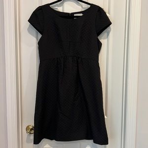 HD in Paris black dress.